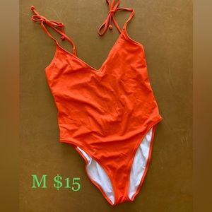 Victoria’s Secret orange one piece swimsuit